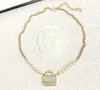 Designer Bag Pendant Neckor for Women Luxury 18k Gold Plated Copper Pearl Handbag Pendant Halsbandsmycken Hög kvalitet