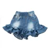 Kjolar sommar småbarn baby ruffle denim kjol shorts söta dubbla fickor design barn byxor barn byxor 1234567 år h240425