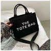Designer Women's Mac Tote Bag Messenger Hand HET THE WOMENS Nuova lettera di spalla Small Square Simple Leisure Fashi