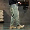 Hiphop jeans män löst fit harem byxor överdimensionerade för man rippade streetwear rivna denim byxor manliga vintage kläder 240417