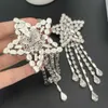 Роскошная мода Shiny Rinestone Crystal Star Tassel Women Clips Серьги ювелирные изделия великолепные сережки