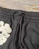 سراويل الرجال Calas de Espuma com estampa harajuku para homens e mulheres leggings grossas soltas calas american kapok strt inverno y2k h240425