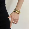 Bijoux moderne perlé européen et américain Bracelet ouvert en métal irrégulier pour femmes accessoires de mode Vente à chaud 240423