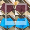 Projektantki szorty męskie damskie odzież kąpielowa Krótka luksusowa wodoodporna haftowana etykieta Szybkie suszenie z siatkową oddychającą sportową sportową spodnie Summer 782