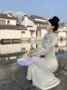 Robes décontractées de style chinois rétro cheongsam qipao robe à manches longues collier de fourrure blanc slim