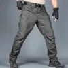 Calças masculinas Novas calças táticas de bolso múltiplo Elasticidade Militar Urbano Tacitcal Tacitcal Cargo à prova d'água Homem Pant 6xl D240425