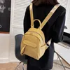 Sac à dos de la mode Femmes mini couleur solide petits sacs à dos simples sacs d'étudiants décontractés voyageant 2024 sac à école