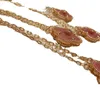 2024 clássico colares de trevo de quatro folhas pingentes Novo colar rosa rosa pedra bloqueio de osso internautas femininas mesmo design pequeno e de luxo