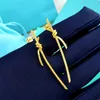 Fashion Simple Ttifeeny Earrings Versatile V Gold Plated Mijin Diamond Inlaid Knot Cord for Womens Light Luxury Twisted Stainless Steel
