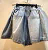 Kvinnors jeans strass denim shorts kvinna sommar bär tung industrigass pärla diamant-inbäddad hög midja bred ben jean