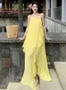Lässige Kleider 2024 Sommer gelbe elegante Halfterrückenless Rüschenkante Lange Kleid Frauen Ärmelloses Strand Urlaub unregelmäßig Sonnenbrenner