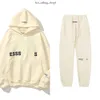 of Fear Esse Mmens Hooded Sportswear Luxury Ess Designer Esstenial Brand Ess Essentialsclothing Long Pants Set Pullover Mens and Womens Couple 629
