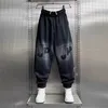 Herrbyxor koreanska nya höstvinterbyxor brev tryck mode gata hip-hop byxa gradient svarta byxor designer män kläder pantalones d240425