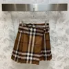Women's Short Skirt Designer Skirt Spring Summer Classic Khaki Plaid One Piece Pleated Half Skirt High Waist College Style Skirt