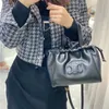 Bolsas de diseñador de celos para personas de alta gama para mujeres Bolso de cuero genuino NUEVO MINI MINI BOLSO BOLSA DE BOLSA PORTABLE A LANGO CAPABLE CON LOGO ORIGINAL