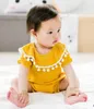 Rompers Baby Bodysuits Summer Soft Cotton Tassel Rompers Boys Girls Korte mouwen Solid Onepiece kleding Pasgeboren kleding 0-24m H240425