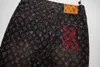 エンターテインメントスポーツジーンズモーターサイクル刺繍穿孔ジーンズ印刷パッチワークフレアジーンズ刺繍スリムフィットハイストリートジーンズ