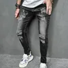 Jeans magri strati strappati da uomo elastico elastico foro piccolo moto pantaloni in denim streetwear maschio 240417