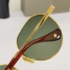 Frauendesigner modische Sonnenbrille mit Metallrahmen Ovaler Rahmen und Polyamidlinsen DT 150 Luxuriöses hellfarbenes dekoratives Spiegel für Frauen und Männer