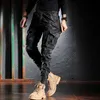 Projektant mody Mężczyźni dżinsy kamuflażowe spodnie Multi Pockets Casual Cargo Pants Hombre Zipper Dom Hip Hop Jogger 240420