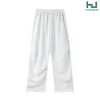 Design de niche de base minimaliste coréen avec un pantalon décontracté plissé rivé pour hommes et femmes, jambe droite, ajustement lâche et pantalon long polyvalent