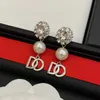 Boucles d'oreilles de haute qualité pour femmes en eau fraîche baroque de perles baroque avec du coeur en forme de zircon oreille