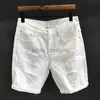 Designer jeans voor heren 2024 Nieuwe Kong trendy witte geperforeerde denim shorts man vrijetijdstrend zomer gekrast bedelaar mode broek