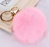 Keychains Real Fur Ball Keychain Soft Lovely Gold Metal Key Chains Pom Poms Plush Car Keyring Bag örhängen Tillbehör