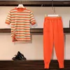 Pantalon de deux pièces pour femmes Summer TricoT 2 set Stripe Stripe Stripe Short à manches conjuntos Femmes de mode coréen Pantalones Tenues