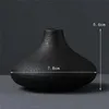 Vases Black Ceramic Small Vase Home Decoration Crafts Ornement Ornement Simplicité Planteur Fleur Vase pour le salon Décor de jardin