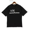 Amirir Shirt Designer Am Mens camiseta feminina camiseta casal de moda de moda de rua impressão de manga curta casual casual masculino de camiseta redonda do pescoço s-xl amis camisa 433