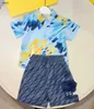 Fashion Kids Designer Clother Boys Shirt Set Baby Tracksuits Suits taille 110-160 cm Shirt de style vacances et imprimé complet de lettres de logo Shorts 24aPril