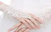 Gants de mariée en dentelle perles de ruban sans doigts Gants de mariage court accessoires de danse de la fête d'opéra 8628510