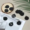 Nyckelringar 25 datorer Runda tomma taggar Black Aluminium Stamping Blanks Discs Metal Keychain Dog Tag