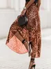 Jupes Summer 2024 mince jupe imprimée léopard mode Loisure personnelle haute taille contractant le genou longue pour les femmes