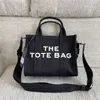 Дизайнерская женская тота Mac Tote Bag MJ Тот же стиль новый маленький маг мини -холст молнии на молнии сумки для покупки модные буквы Руководитель