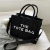 Designer Women's Mac Tote Bag Messenger Hand HET THE WOMENS Nuova lettera di spalla Small Square Simple Leisure Fashi