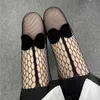 セクシーな靴下パンスト日本のパーティーフィッシュネットブラックタイツボウノットjkメッシュロリータホールビッグサイズセクシーな薄手の女の子