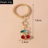 Klasynie Smyczowe urocze owoce Cherry Bierek do samochodu Kluczowe pamiątki Prezenty dla kobiet mężczyzn torebka wiszące pierwiastki DIY Jewelry Akcesoria