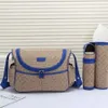 Baby Bag Designer Change Bag Fashion Wickelbeutel Babys Windeln große stillende Mama -Windel -Taschen Vintage Letter Zipper -Tasche 3PCS -Sets Wechseln Sie den Mattenflaschenhalter um