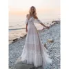 Robe en dentelle Long Wedding Bohemian Spaghetti Backlessless A-Line Tulle Boho Beach Bridal Bridal Sweep Train Back Lace-Up Plus taille Summer Robe de Mariage -Up