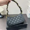 Bolso de descuento de marca de lujo NUEVA Avanzada Fashion Axila a las axilas Cadena de bolsas para mujer Versátiles de hombro único