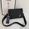 JOUR PAQUE NOUVEAU Étudiant Kangaroo Small Small Version coréenne Bag de croix imprimée à la mode Sac épaule simple et atmosphérique