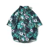 Casual shirts van heren Hawaiiaanse bloemhemd Heren Graffiti Gedrukte shirt met korte mouwen Trendy Amerikaans Cubaanse kraag strandshirt Paren Kleding 240424