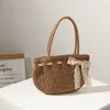 Totes Bow Woven Axel Bag 2024 One-Shoulder Portable Hand-Woven Straw Seaside Holiday Beach Pure Color Handväska