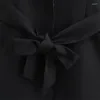 Chalecos femeninos keyanketian 2024 Lanzamiento con decoración del cinturón Chaleco negro elegante simplemente delgada vástago de tanque de longitud media delgada
