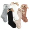 Chaussettes pour enfants Nouveaux enfants Soches hautes genouses Baby Girls Boys Bow Sock Long Coton Soft Cotton Enfants respirants Hollow Out chaussette pendant 0 à 6 ans