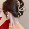 Klemmen 2024 Nieuwe Chinese Dragon Year Hair Clips Haaraccessoires voor vrouwen Girl Red Bead Metal Rhinestone Hair Pin Fashion Jewelry Tiara Y240425