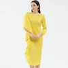春の女性エレガントなハイセンスニッチドレスデザイン非対称のソリッドカラーステッチスカート