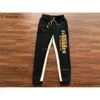 Calças do designer Man S Spliced Rhude Sortpants Sorto Jogador Corretas de cordão calça masculina letra de bordado bordado hip hop Sorto de moletom Homens Mulheres casuais trilhas soltas